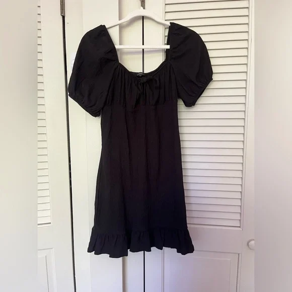 black flowy mini dress Shop Black Solid Flowy Mini Dress - for Women | OUTZIDR main image 0
